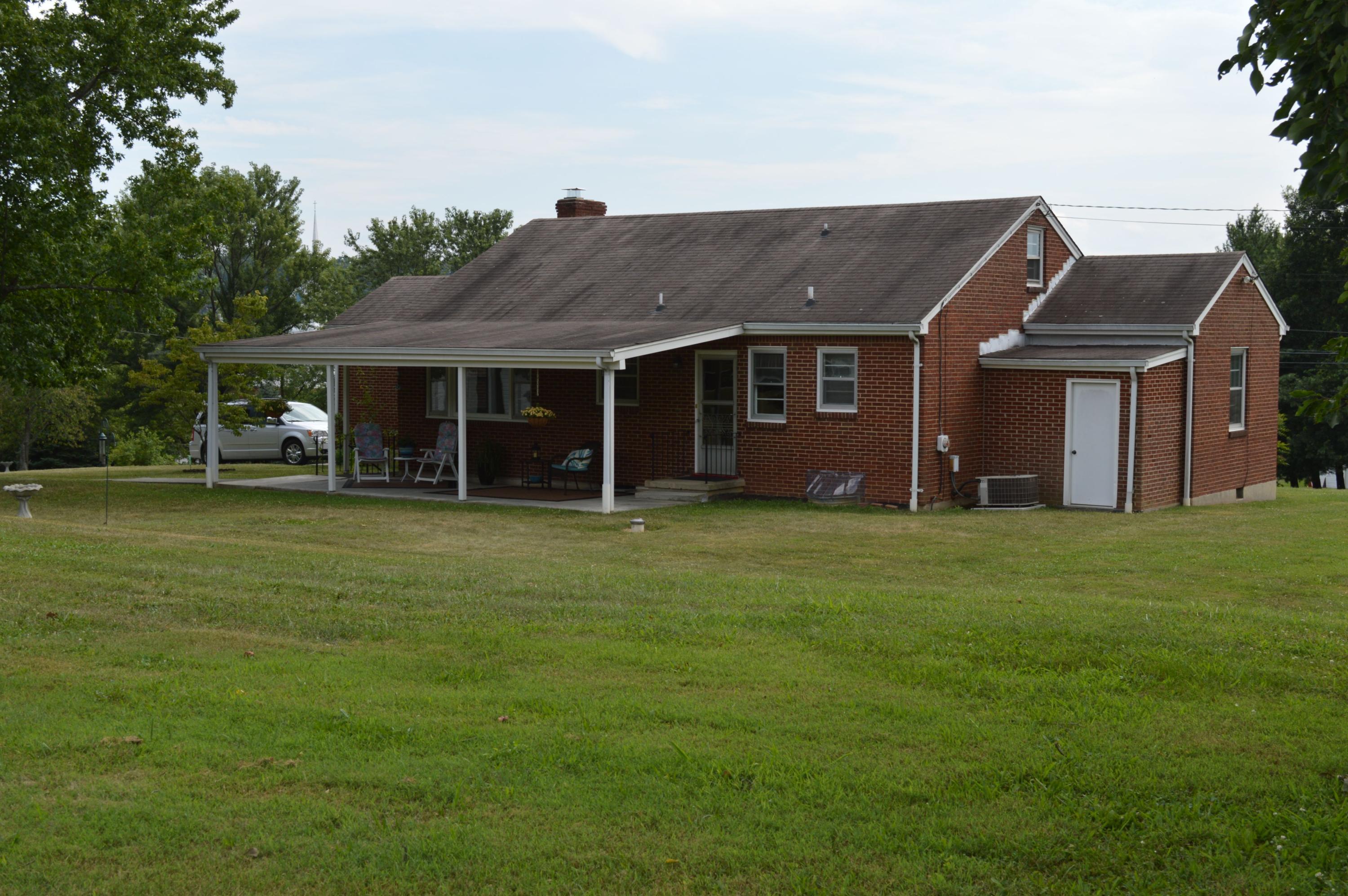 5527 Cove Road Roanoke, VA 24019 - Photo 10 of 39 a view of a house with a backyard