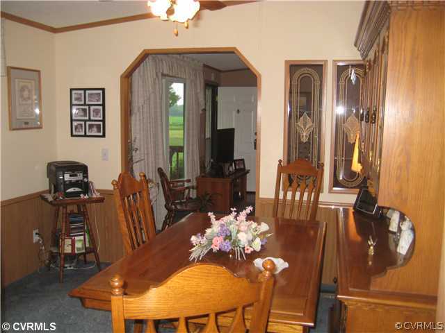 1222 Bible Road Crewe, VA 23930 - Photo 5 of 12 a view of a dining room with furniture and wooden floor