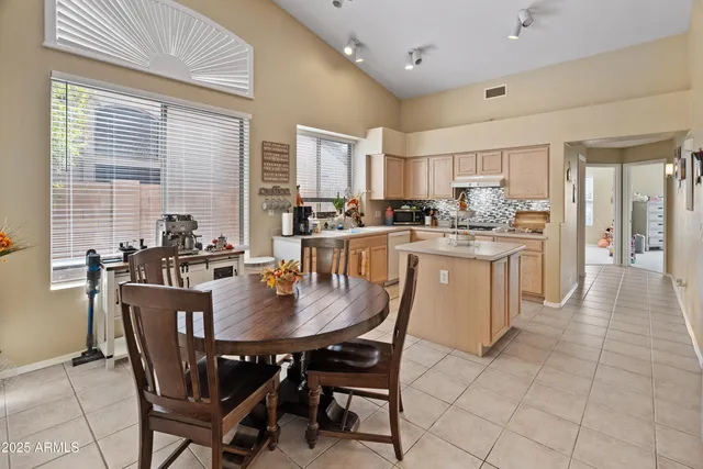 a view of a dining room with furniture
