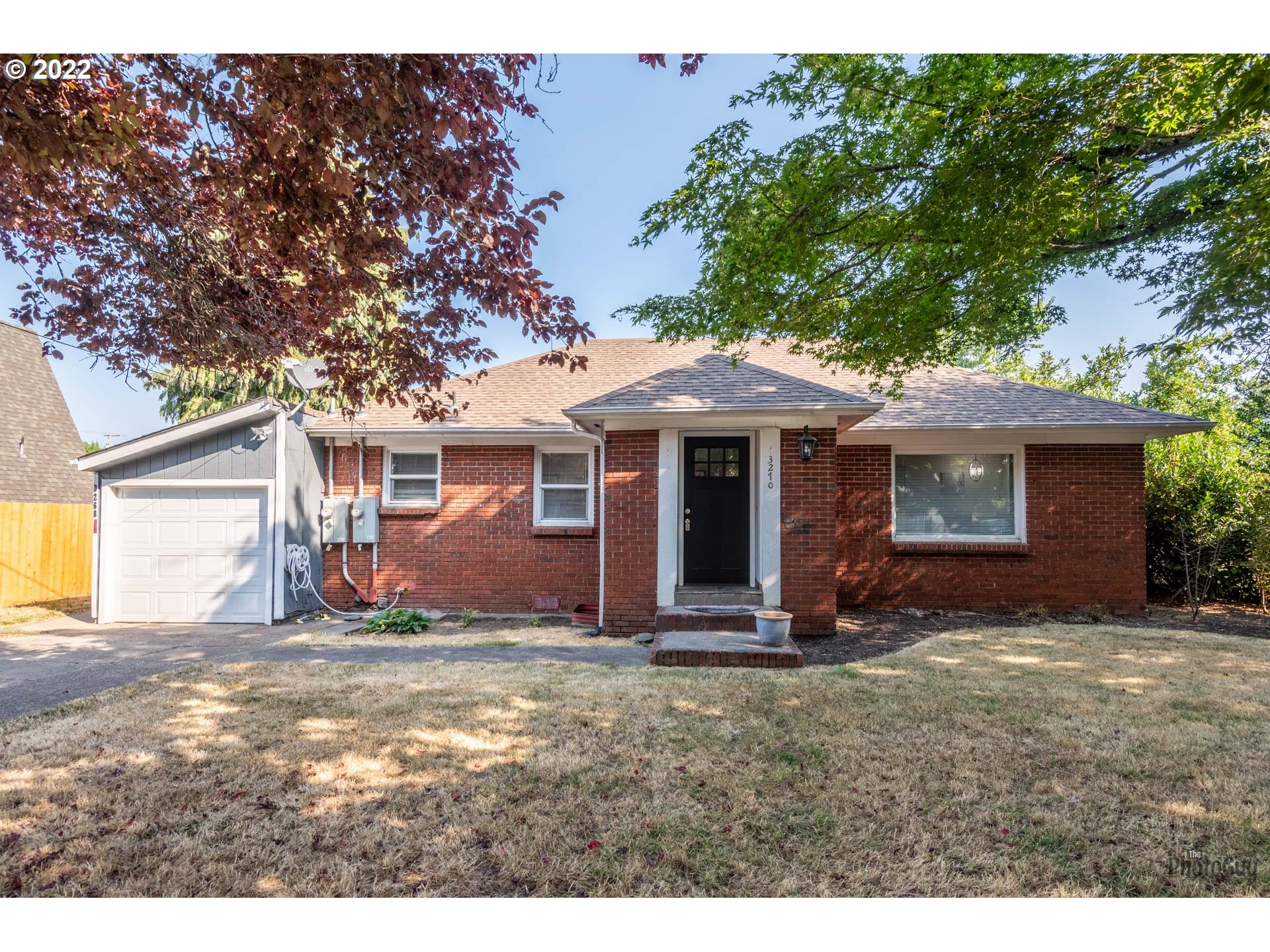 3268 Oregon Avenue Springfield, OR 97478 - Photo 1 of 32 a view of a house with backyard porch and sitting area