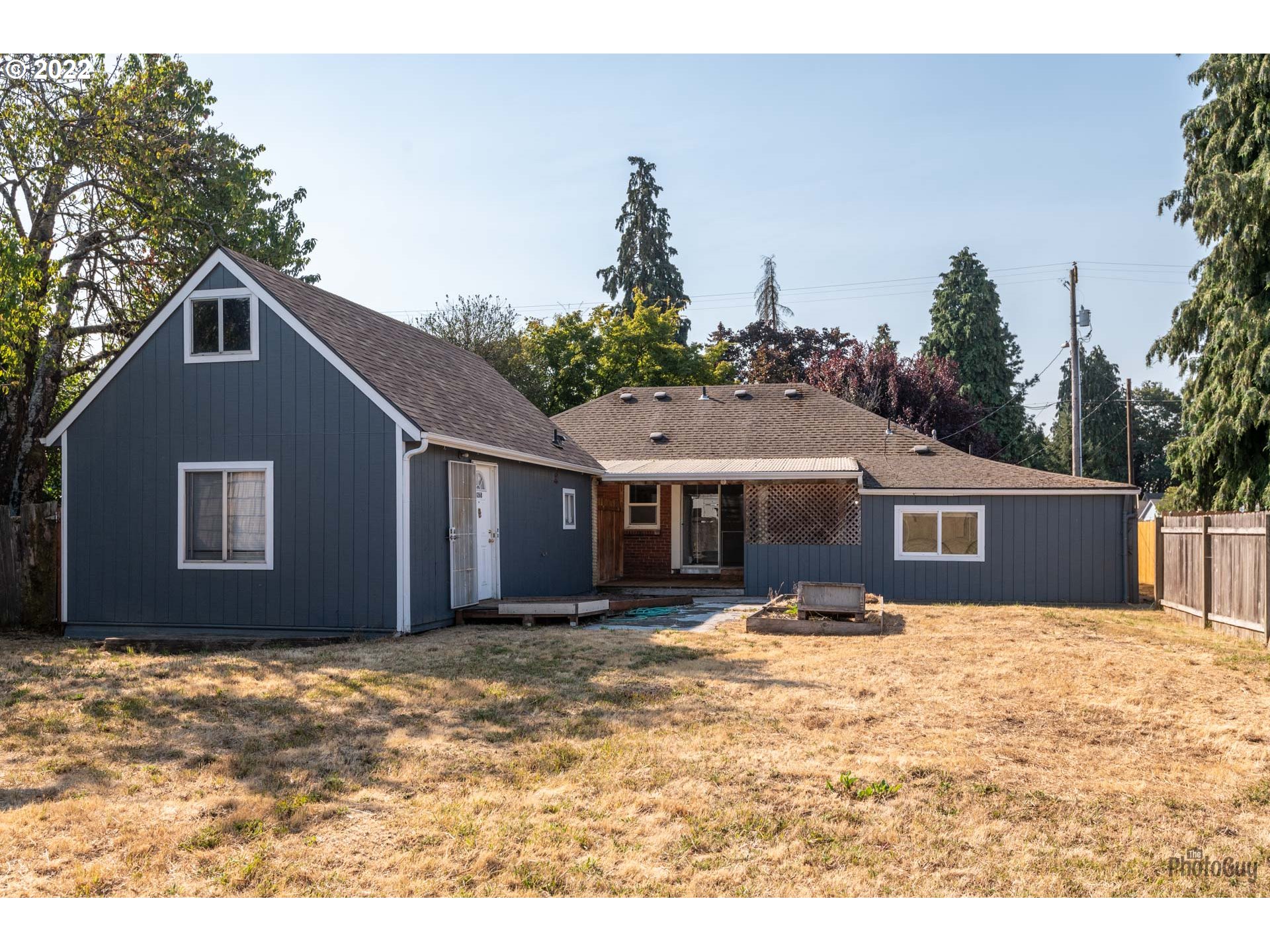 3268 Oregon Avenue Springfield, OR 97478 - Photo 31 of 32 a house with a yard