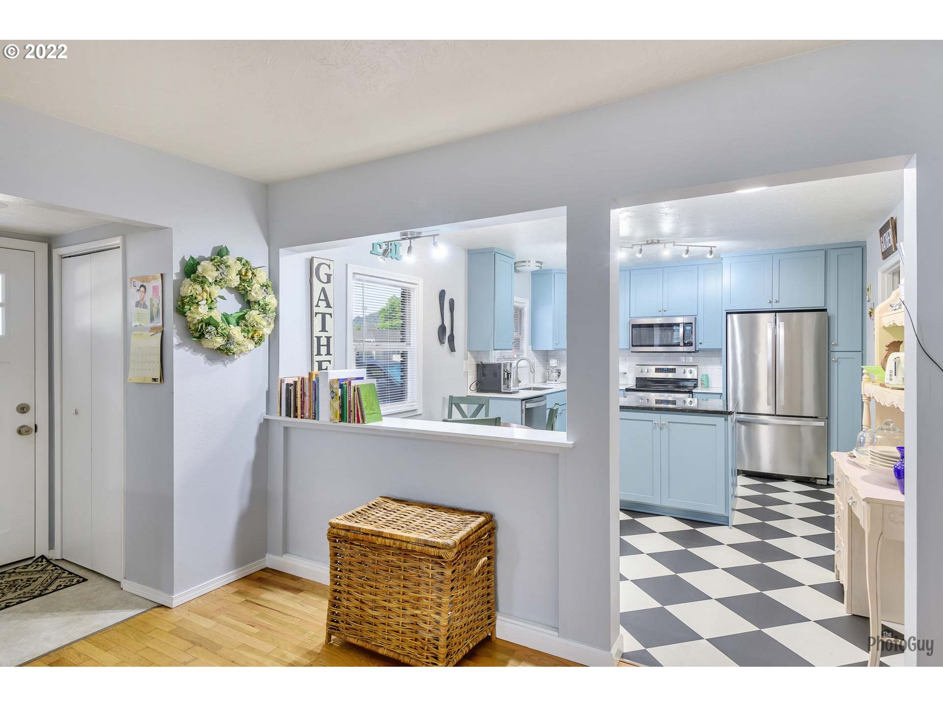 3268 Oregon Avenue Springfield, OR 97478 - Photo 6 of 32 a kitchen with stainless steel appliances kitchen island granite countertop a refrigerator and a sink