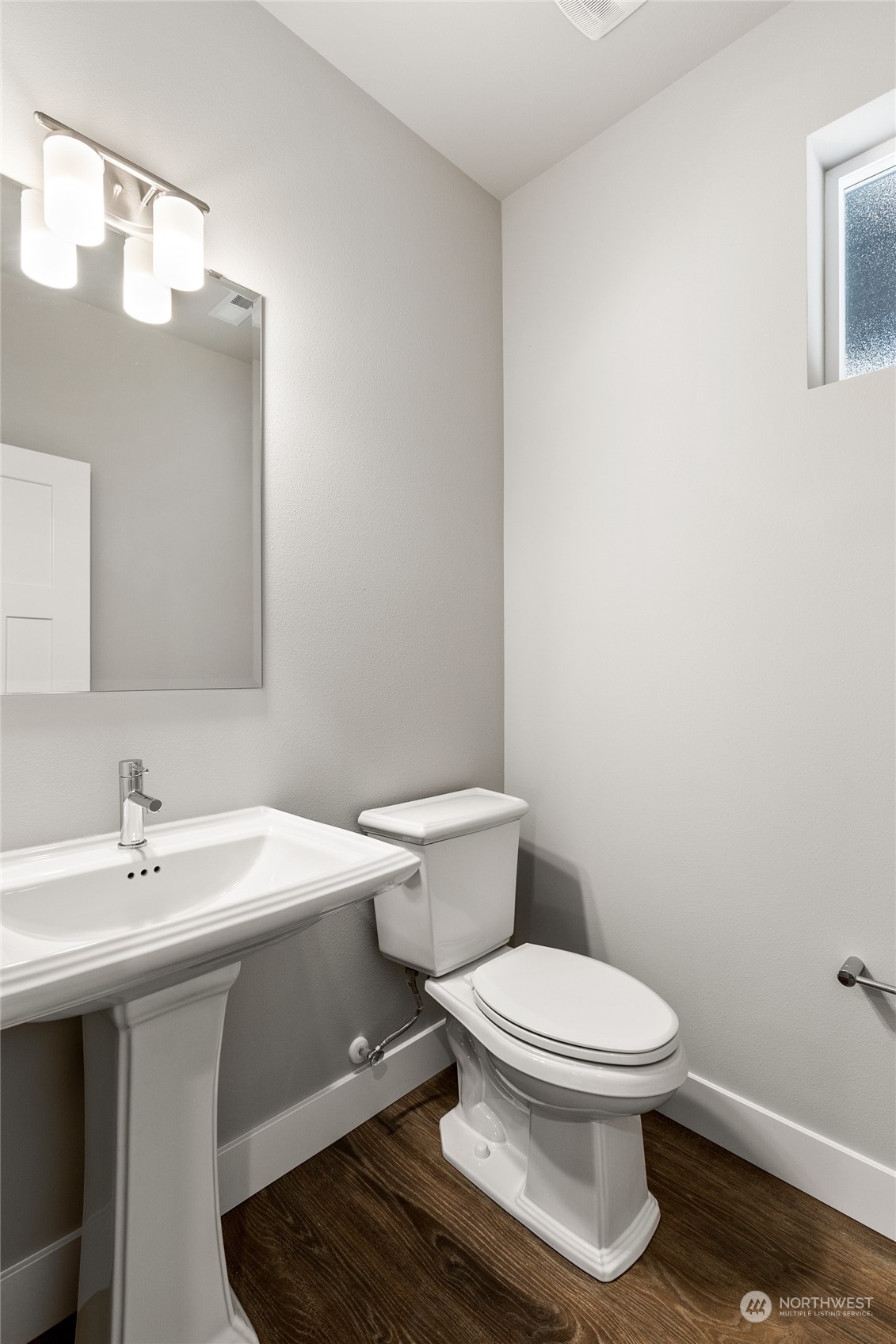 17 178th Place Southwest Bothell, WA 98012 - Photo 11 of 32 a white toilet sitting next to a bathroom sink