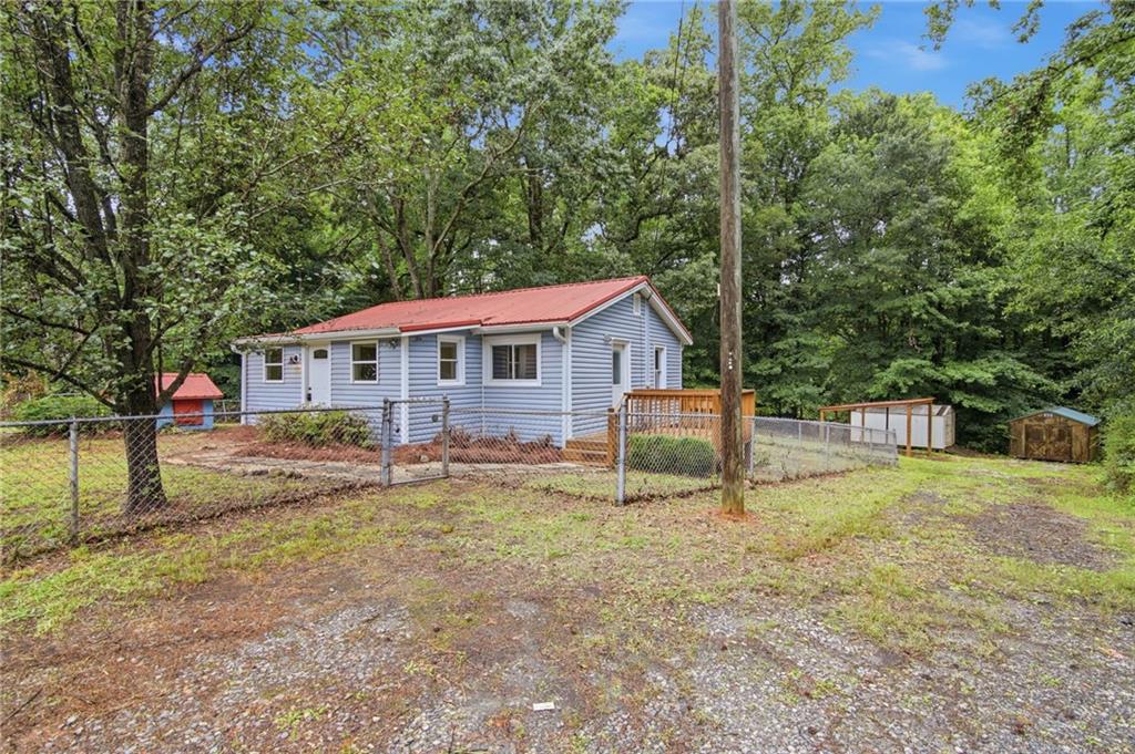 6815 Bannister Road Cumming, GA 30028 - Photo 3 of 35