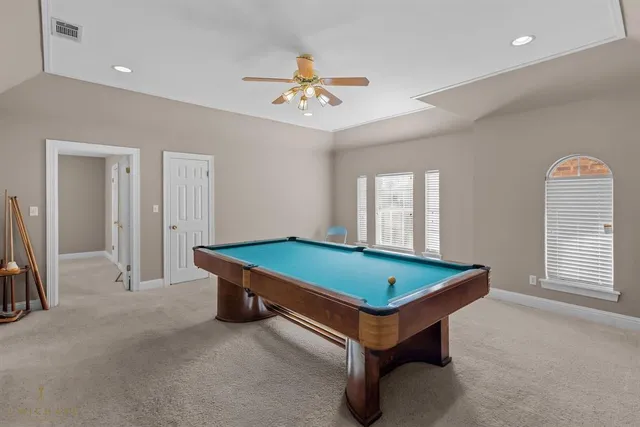 a view of room with window and furniture