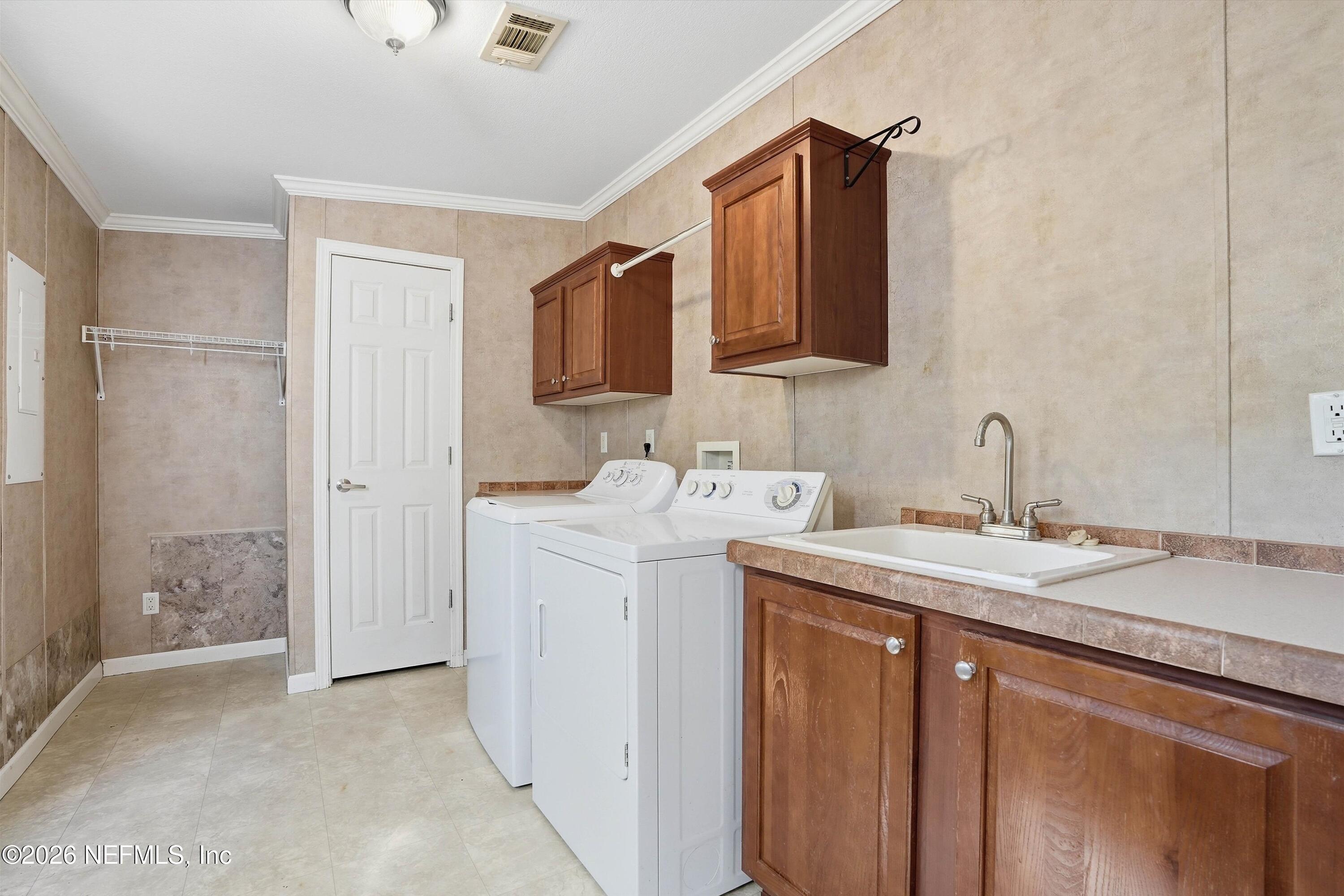 5625 Caribbean Circle Keystone Heights, FL 32656 - Photo 11 of 38 11-Laundry
