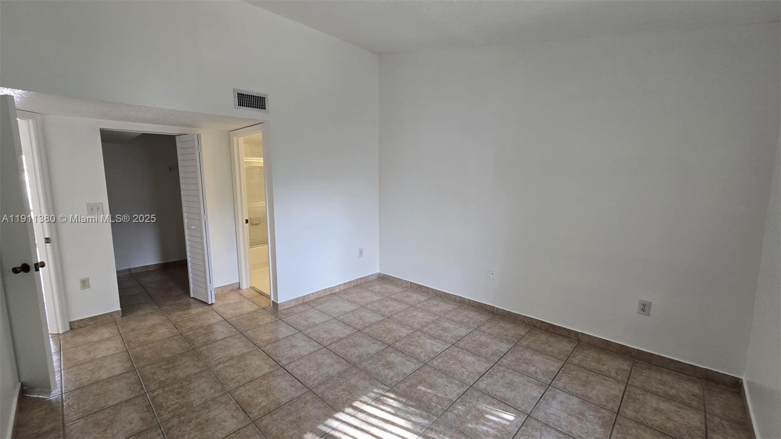 13120 Southwest 64th Terrace, Unit 1510 Miami, FL 33183 - Photo 12 of 24 a view of an empty room