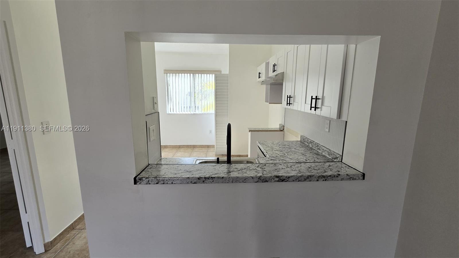 13120 Southwest 64th Terrace, Unit 1510 Miami, FL 33183 - Photo 17 of 25 a bathroom with a mirror