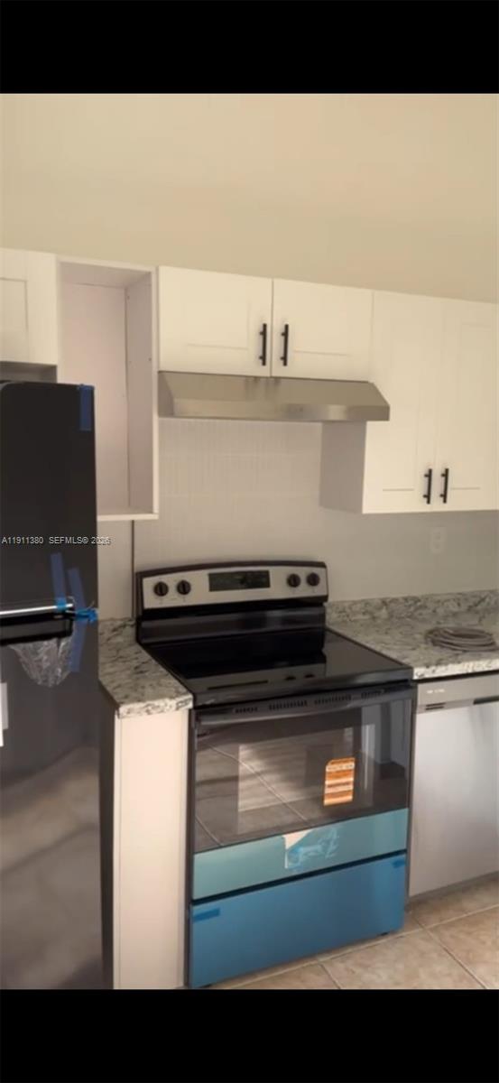 13120 Southwest 64th Terrace, Unit 1510 Miami, FL 33183 - Photo 24 of 25 a close view of kitchen sink appliances and cabinets