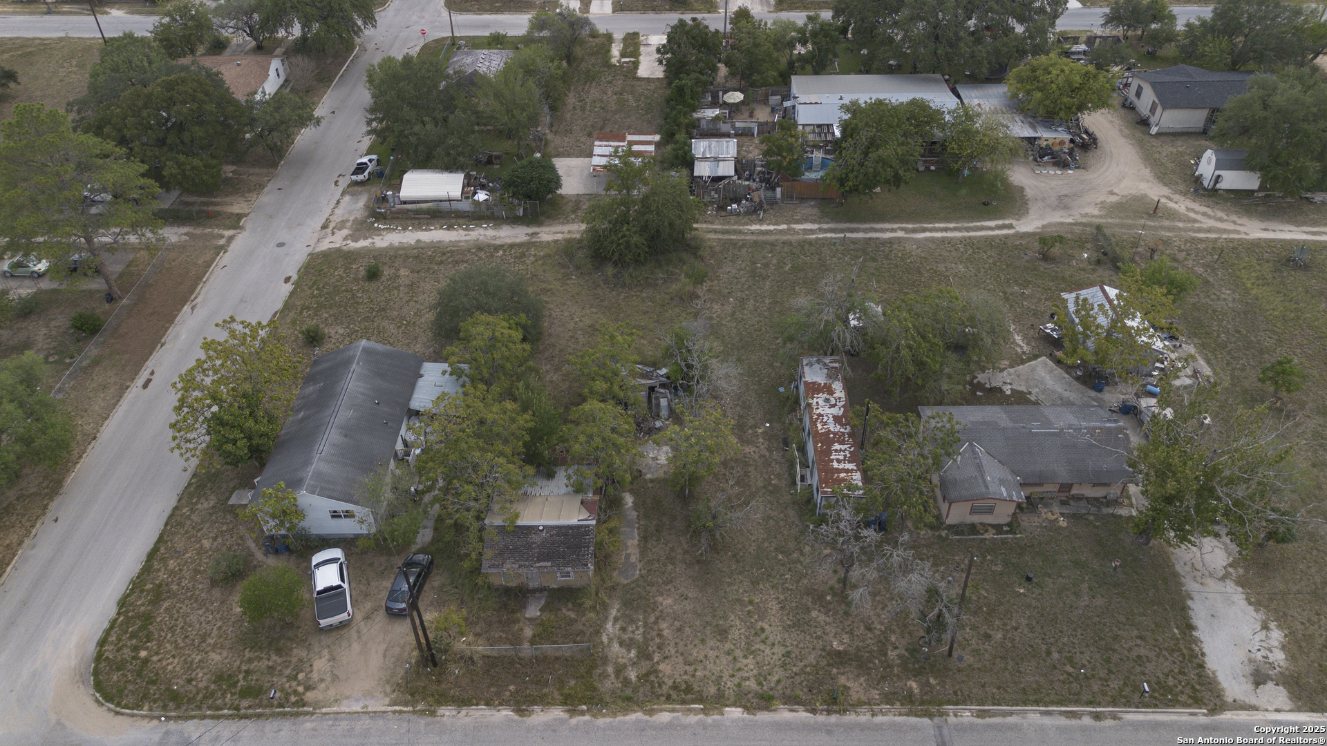 732 Trade Street Pleasanton, TX 78064 - Photo 9 of 13 an aerial view of a house with a yard