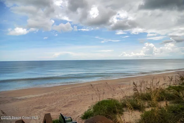 a view of beach and ocean