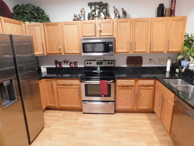 $310,000 | 2412 Fox River Parkway, Unit L, Waukesha, WI 53189