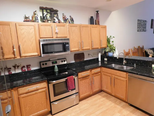 $310,000 | 2412 Fox River Parkway, Unit L, Waukesha, WI 53189