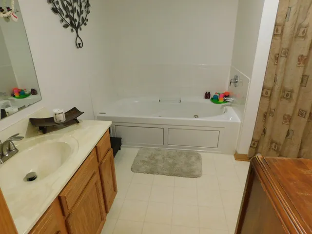 $310,000 | 2412 Fox River Parkway, Unit L, Waukesha, WI 53189