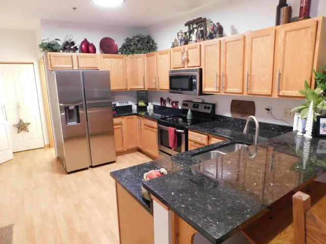 $310,000 | 2412 Fox River Parkway, Unit L, Waukesha, WI 53189