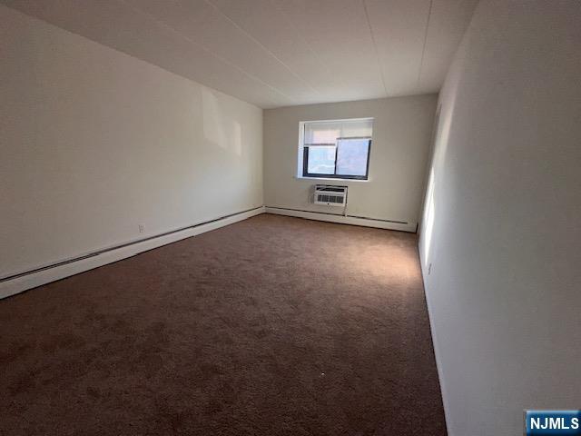 873 Main Street, Unit 2E Hackensack, NJ 07601 - Photo 11 of 23 an empty room with windows