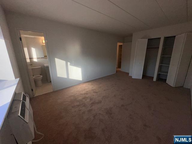 873 Main Street, Unit 2E Hackensack, NJ 07601 - Photo 14 of 23 a view of empty room with wooden floor