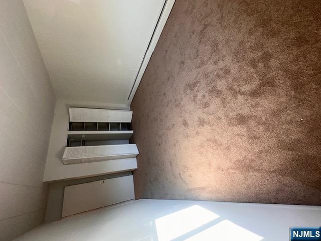 873 Main Street, Unit 2E Hackensack, NJ 07601 - Photo 16 of 23 an empty room with windows