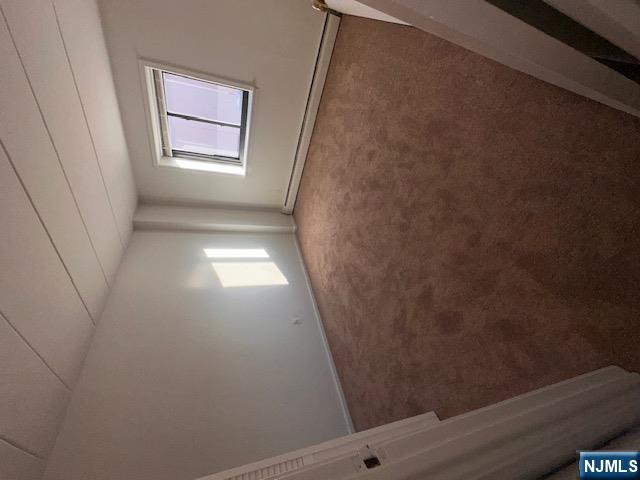 873 Main Street, Unit 2E Hackensack, NJ 07601 - Photo 17 of 23 an empty room with windows
