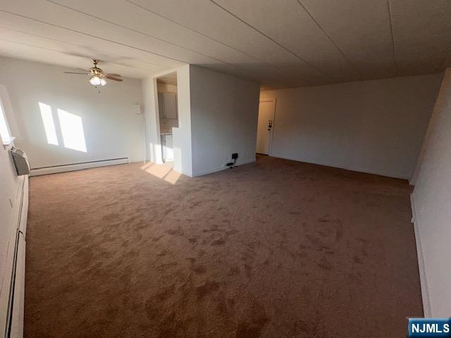 873 Main Street, Unit 2E Hackensack, NJ 07601 - Photo 2 of 23 an empty room with a empty space and windows