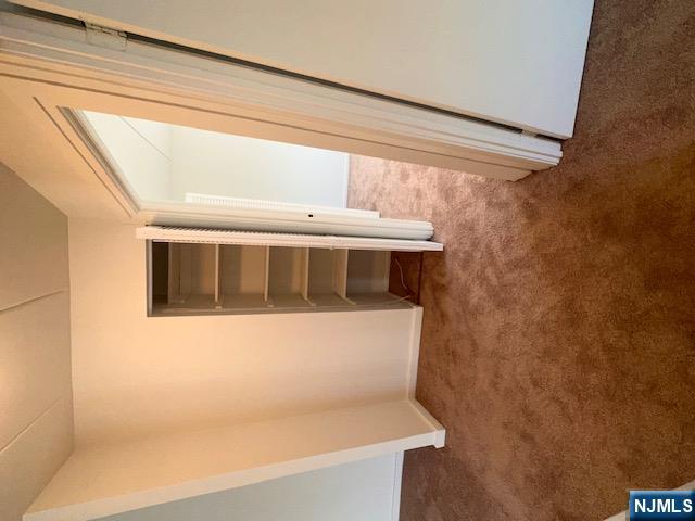 873 Main Street, Unit 2E Hackensack, NJ 07601 - Photo 8 of 23 a view of room and front door