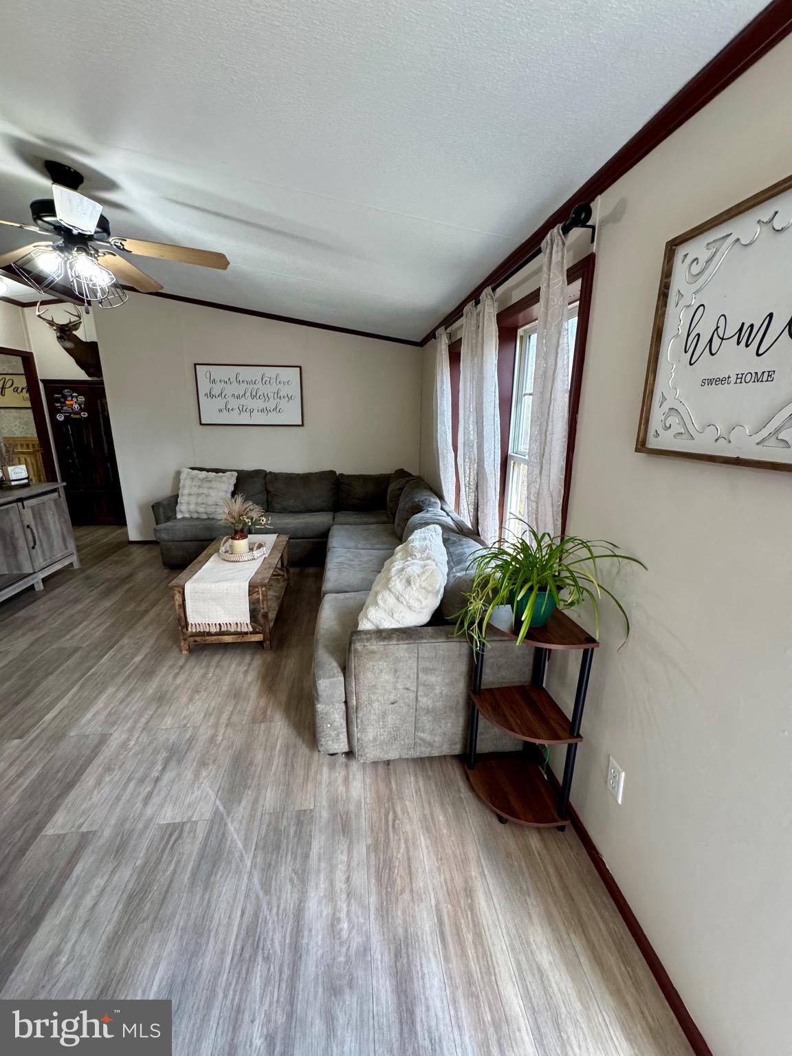 73 Mill Gap Road Brandywine, WV 26802 - Photo 11 of 35 a living room with furniture and a wooden floor
