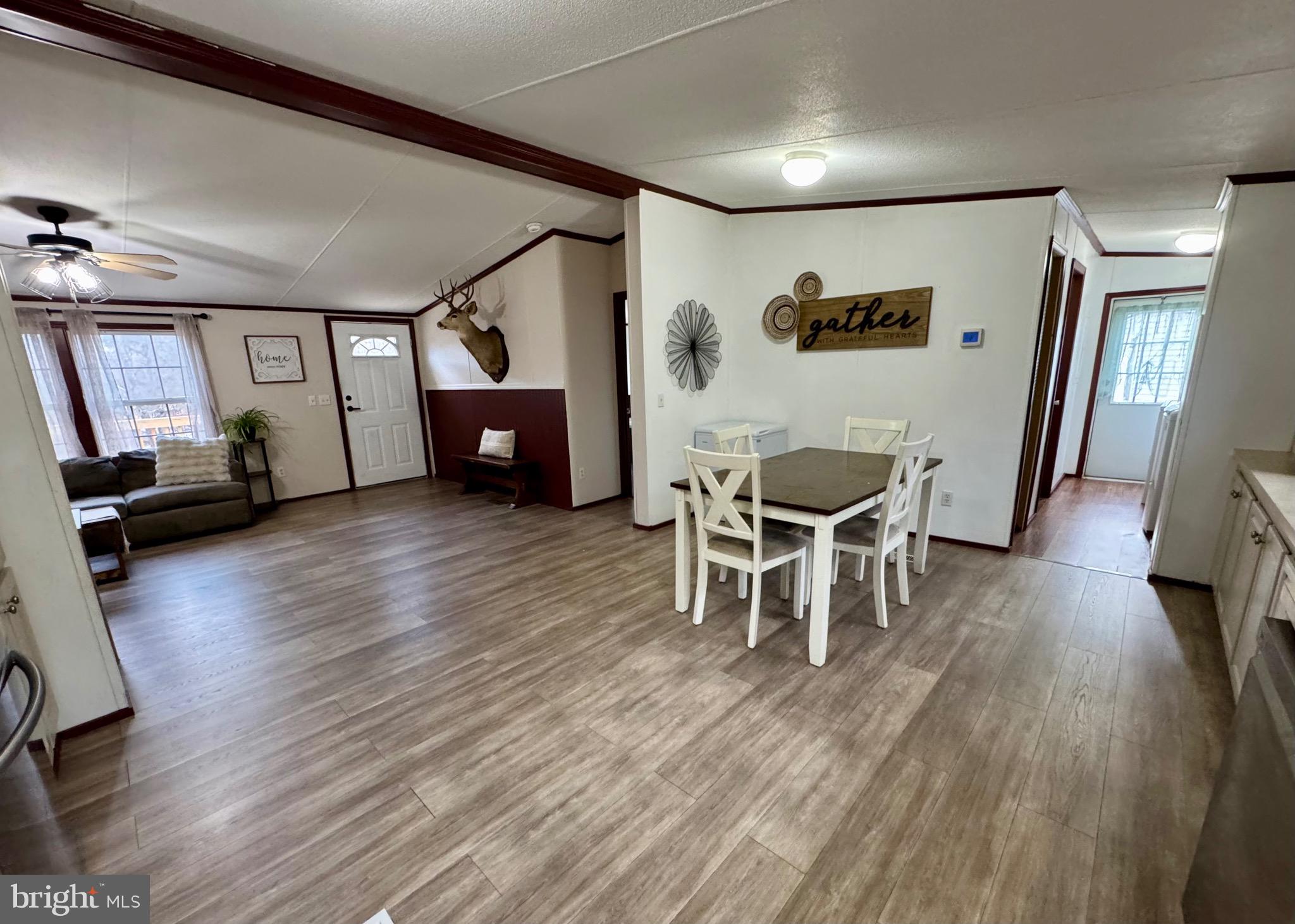 73 Mill Gap Road Brandywine, WV 26802 - Photo 13 of 35 a living room with furniture and a wooden floor