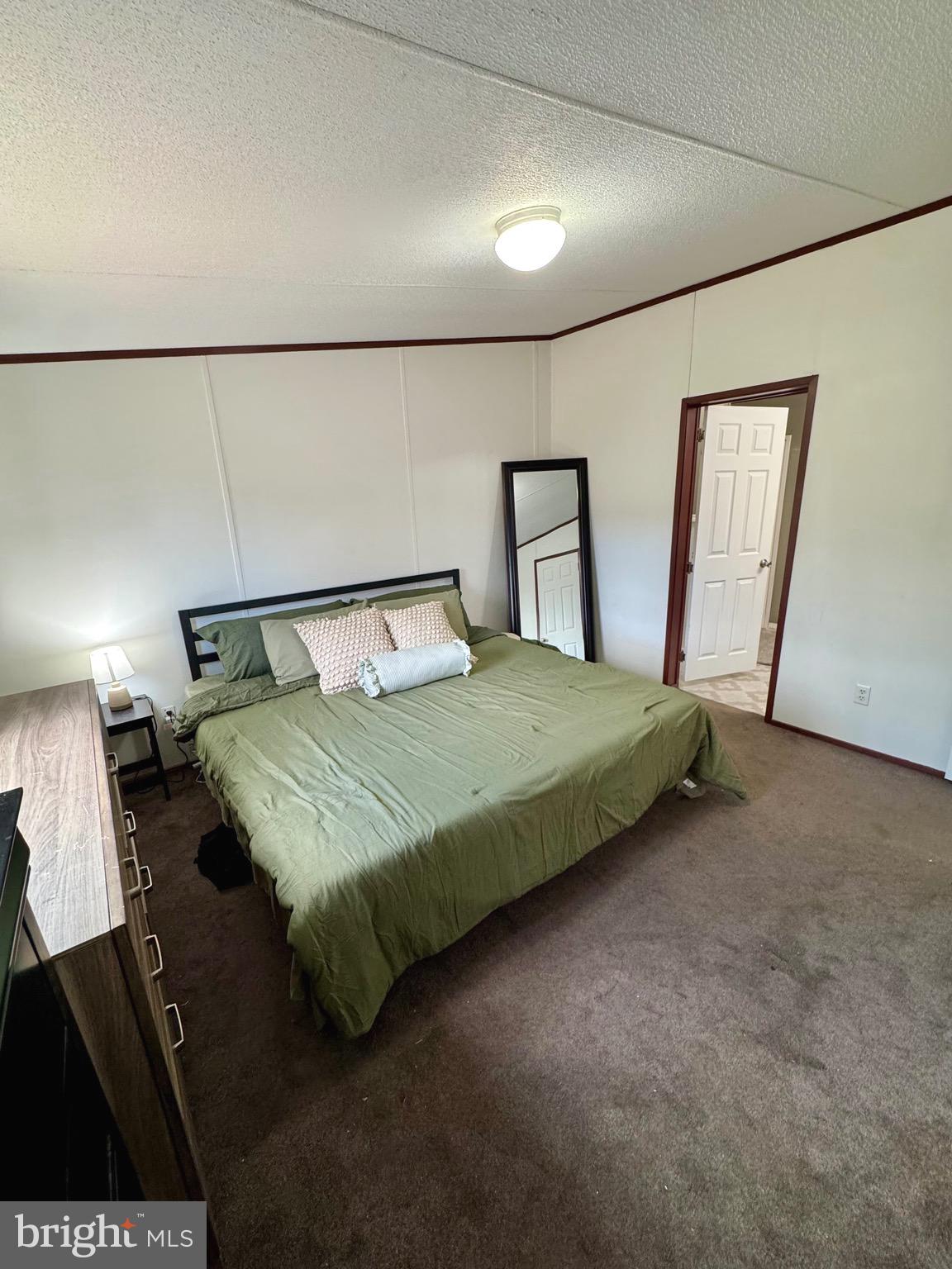 73 Mill Gap Road Brandywine, WV 26802 - Photo 18 of 35 a bedroom with a bed and window