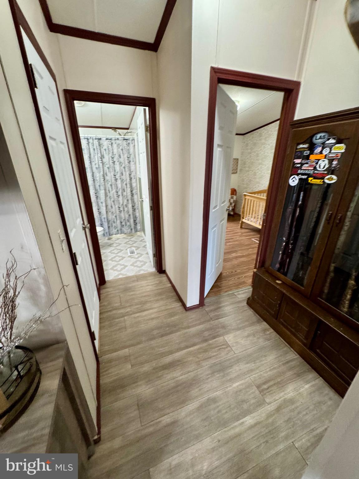 73 Mill Gap Road Brandywine, WV 26802 - Photo 23 of 35 a view of a hallway with wooden floor and stairs
