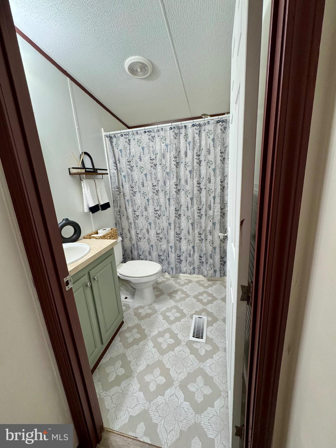 73 Mill Gap Road Brandywine, WV 26802 - Photo 27 of 35 a bathroom with a sink toilet and shower