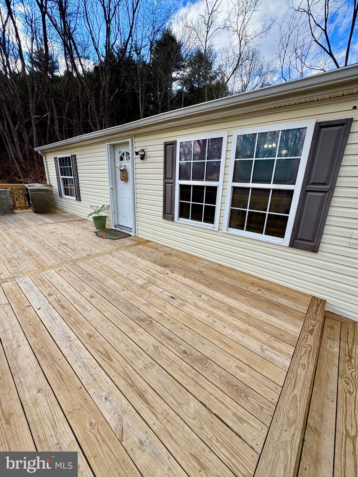 73 Mill Gap Road Brandywine, WV 26802 - Photo 4 of 35 a view of a house with a backyard