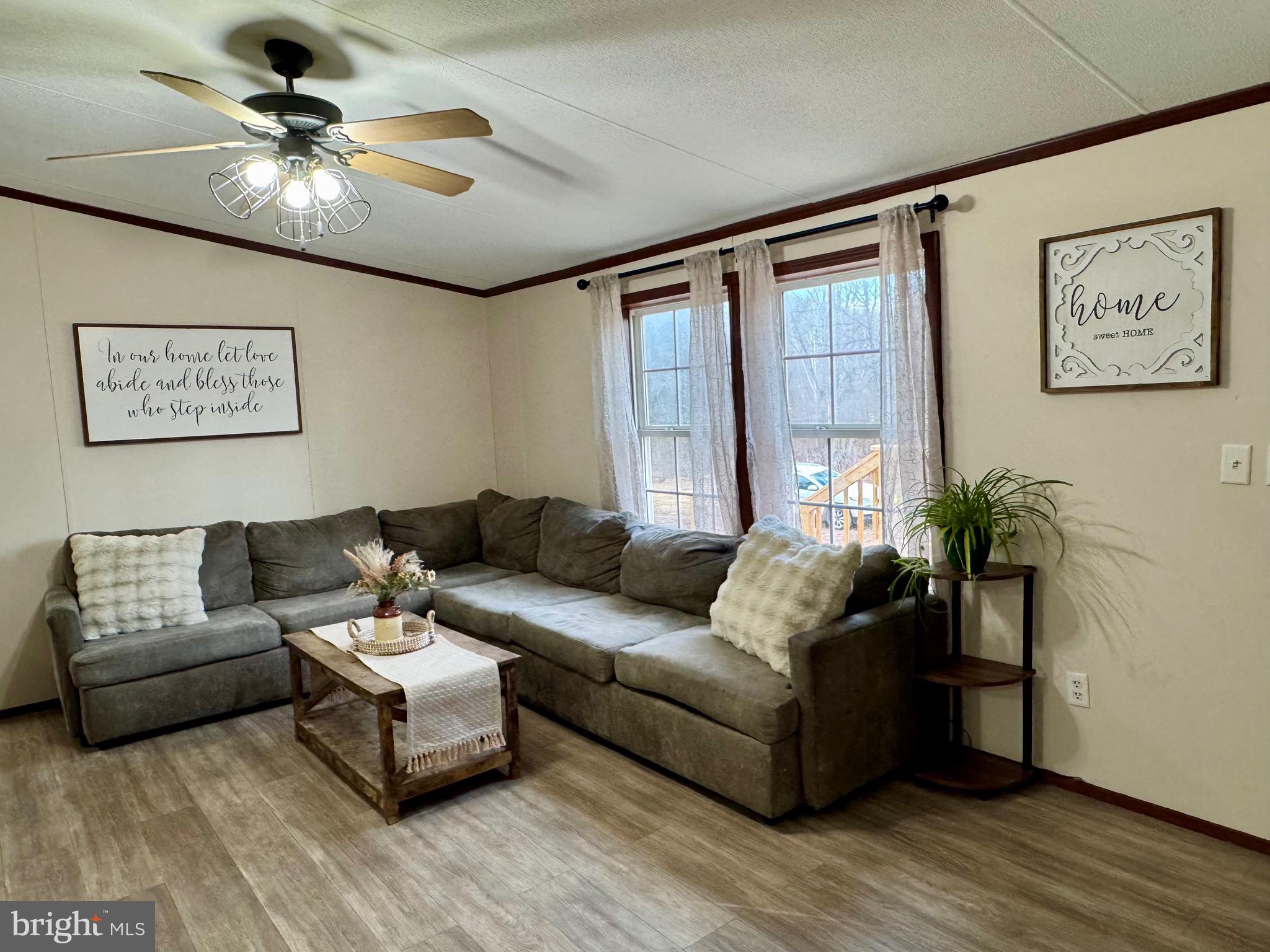73 Mill Gap Road Brandywine, WV 26802 - Photo 9 of 35 a living room with furniture and a large window