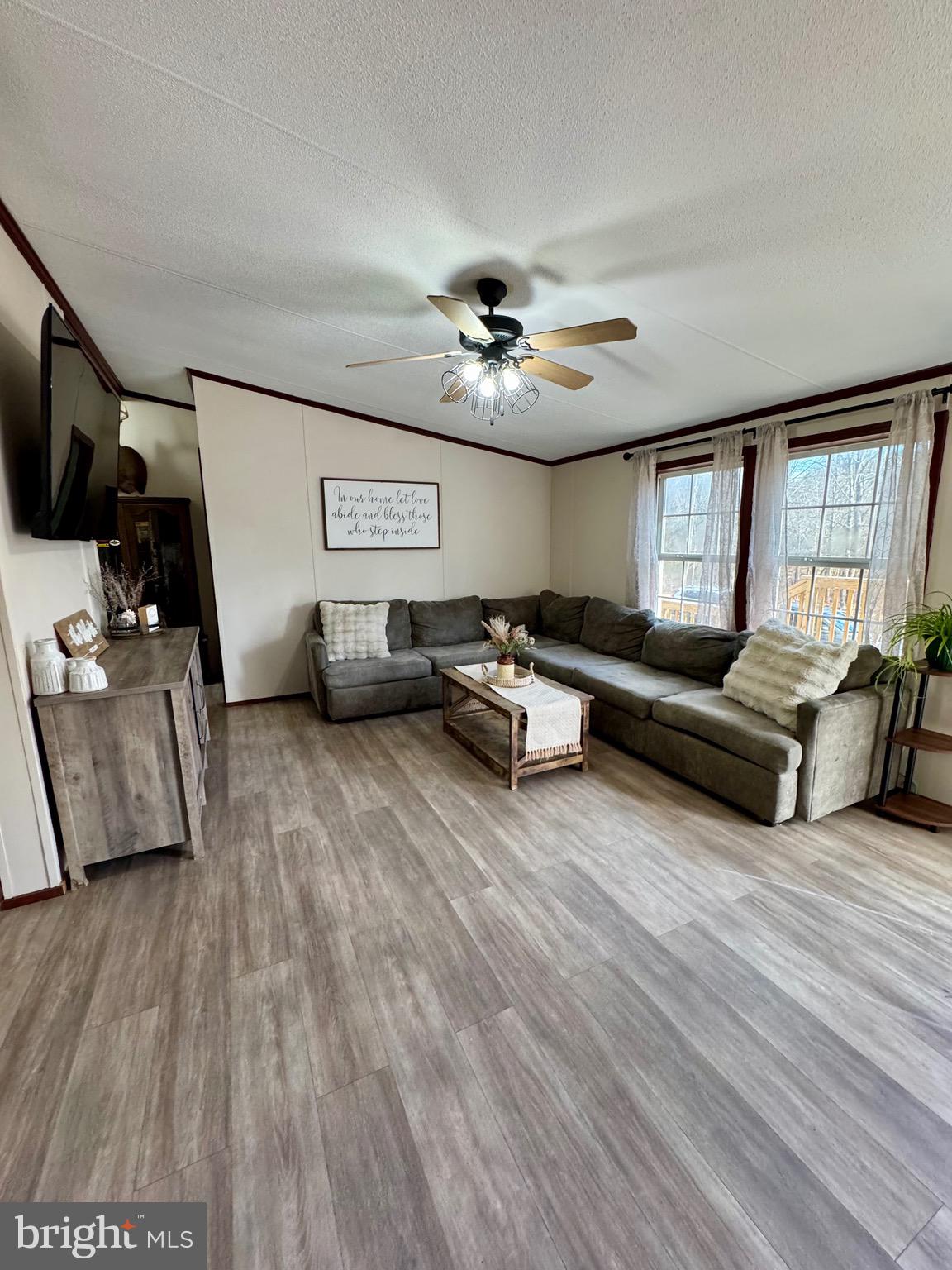 73 Mill Gap Road Brandywine, WV 26802 - Photo 10 of 35 a living room with furniture and a flat screen tv