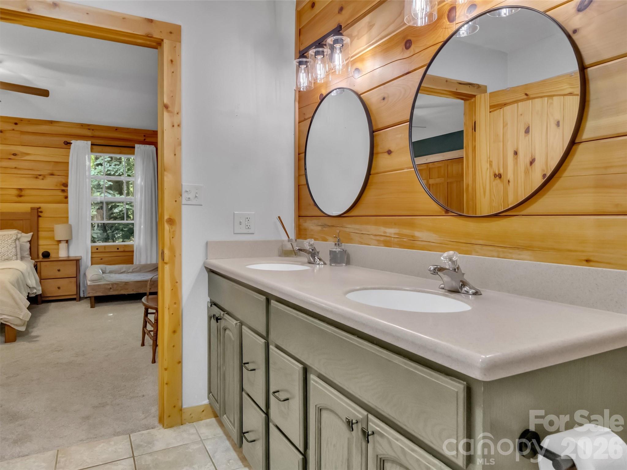 49 Brandywine Road Waynesville, NC 28786 - Photo 21 of 38 a bathroom with a sink and a mirror