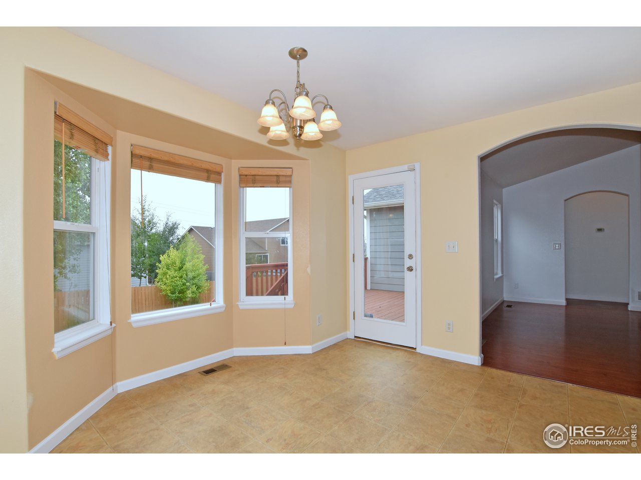 924 Cliffrose Way Severance, CO 80550 - Photo 11 of 40 a view of an empty room with a window
