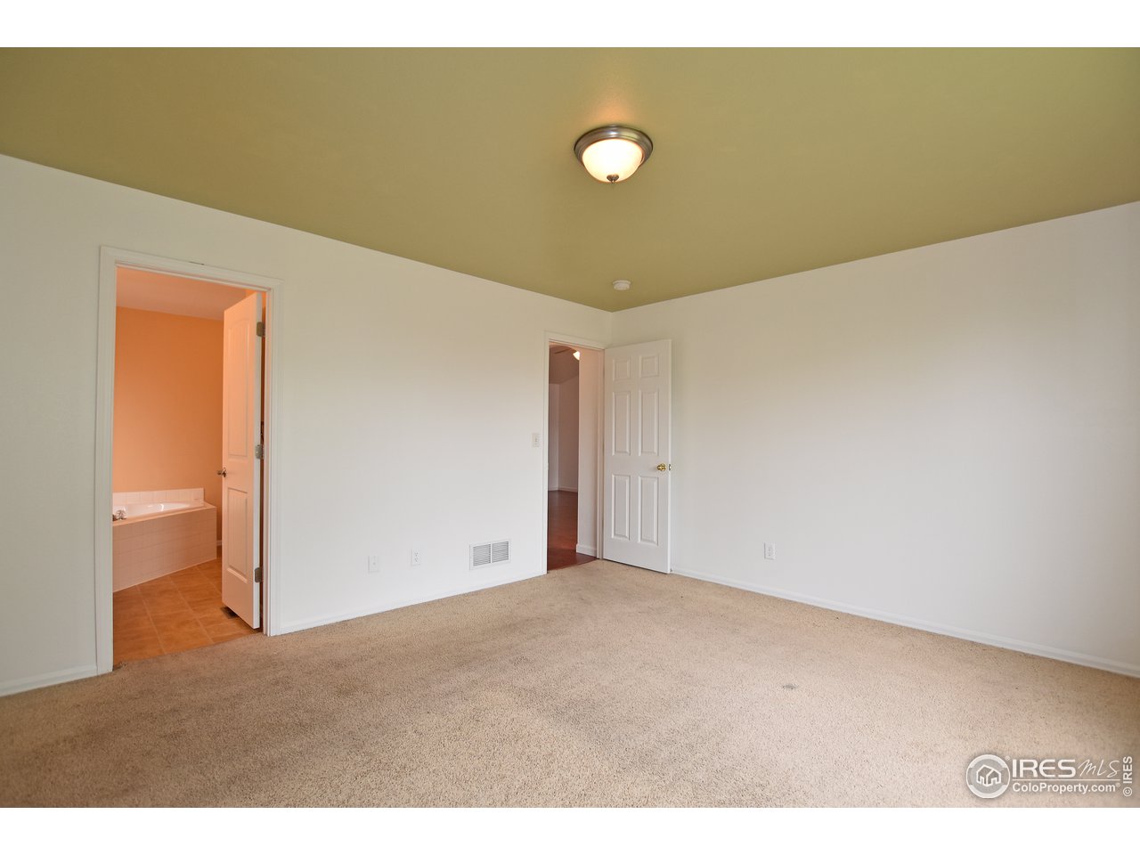 924 Cliffrose Way Severance, CO 80550 - Photo 23 of 40 a view of an empty room
