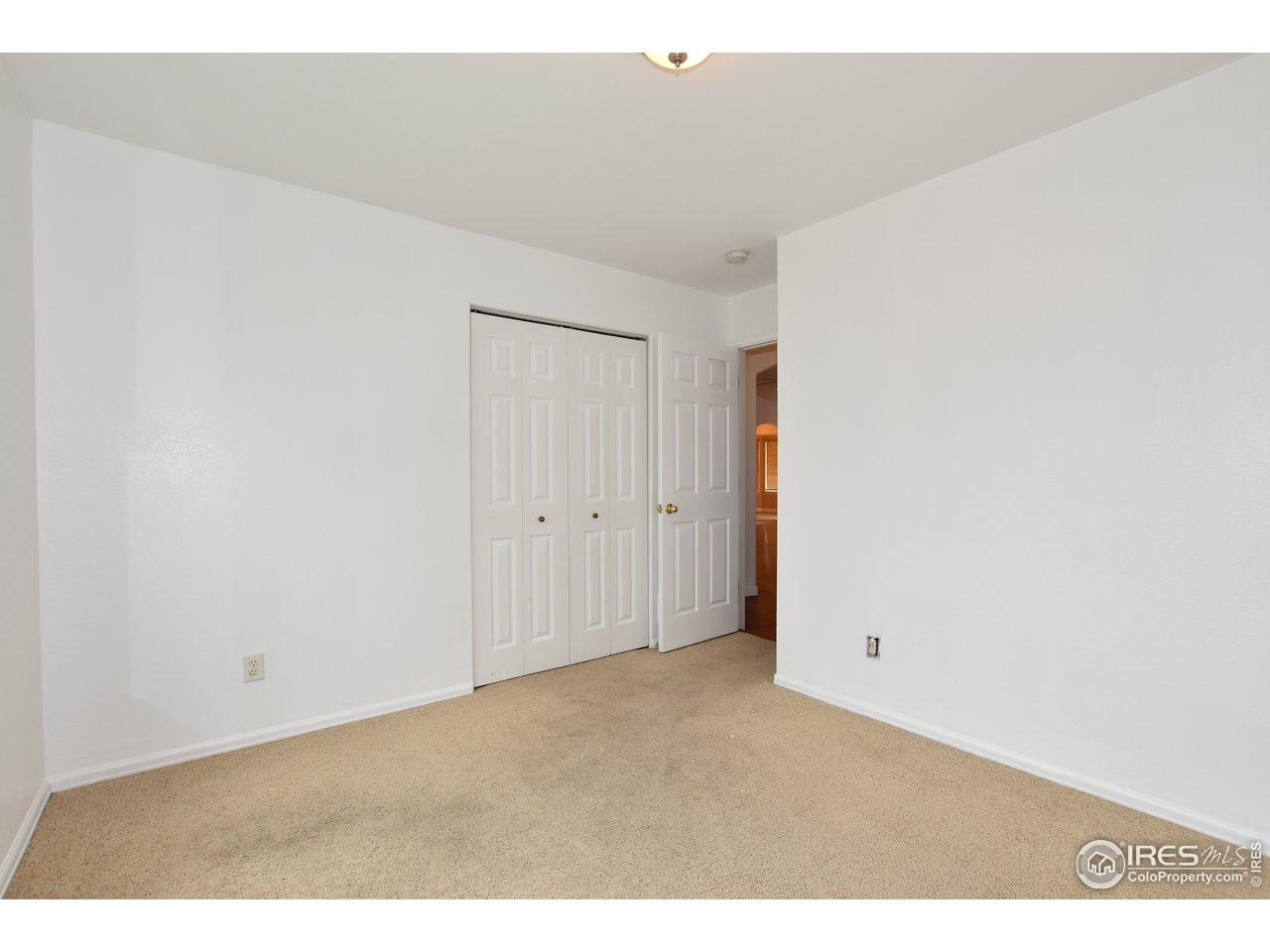 924 Cliffrose Way Severance, CO 80550 - Photo 32 of 40 a view of an empty room