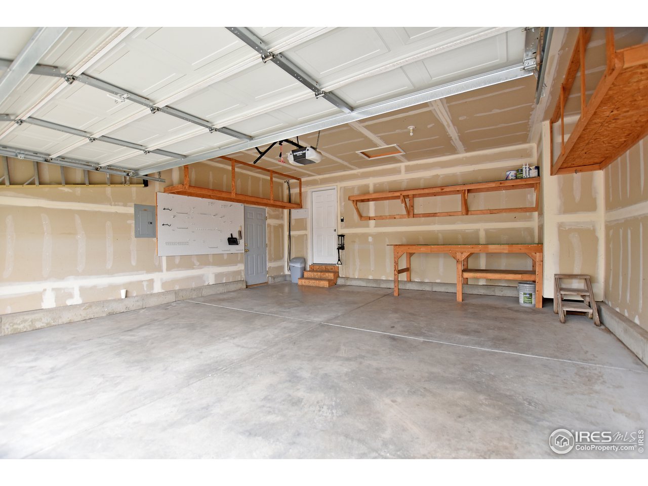 924 Cliffrose Way Severance, CO 80550 - Photo 39 of 40 a view of a big room with air conditioner duct and materials on floor
