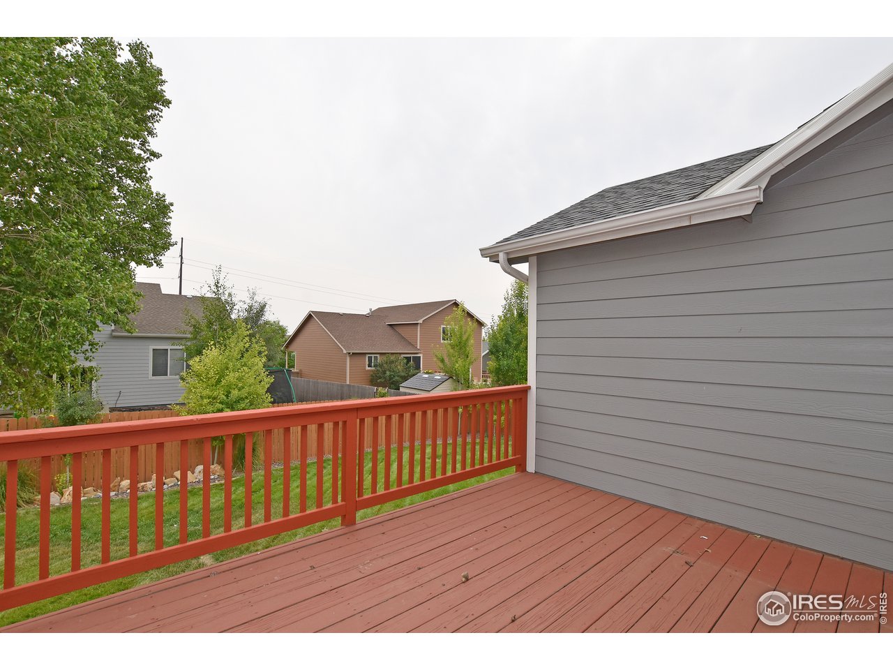924 Cliffrose Way Severance, CO 80550 - Photo 8 of 40 a view of balcony with wooden floor