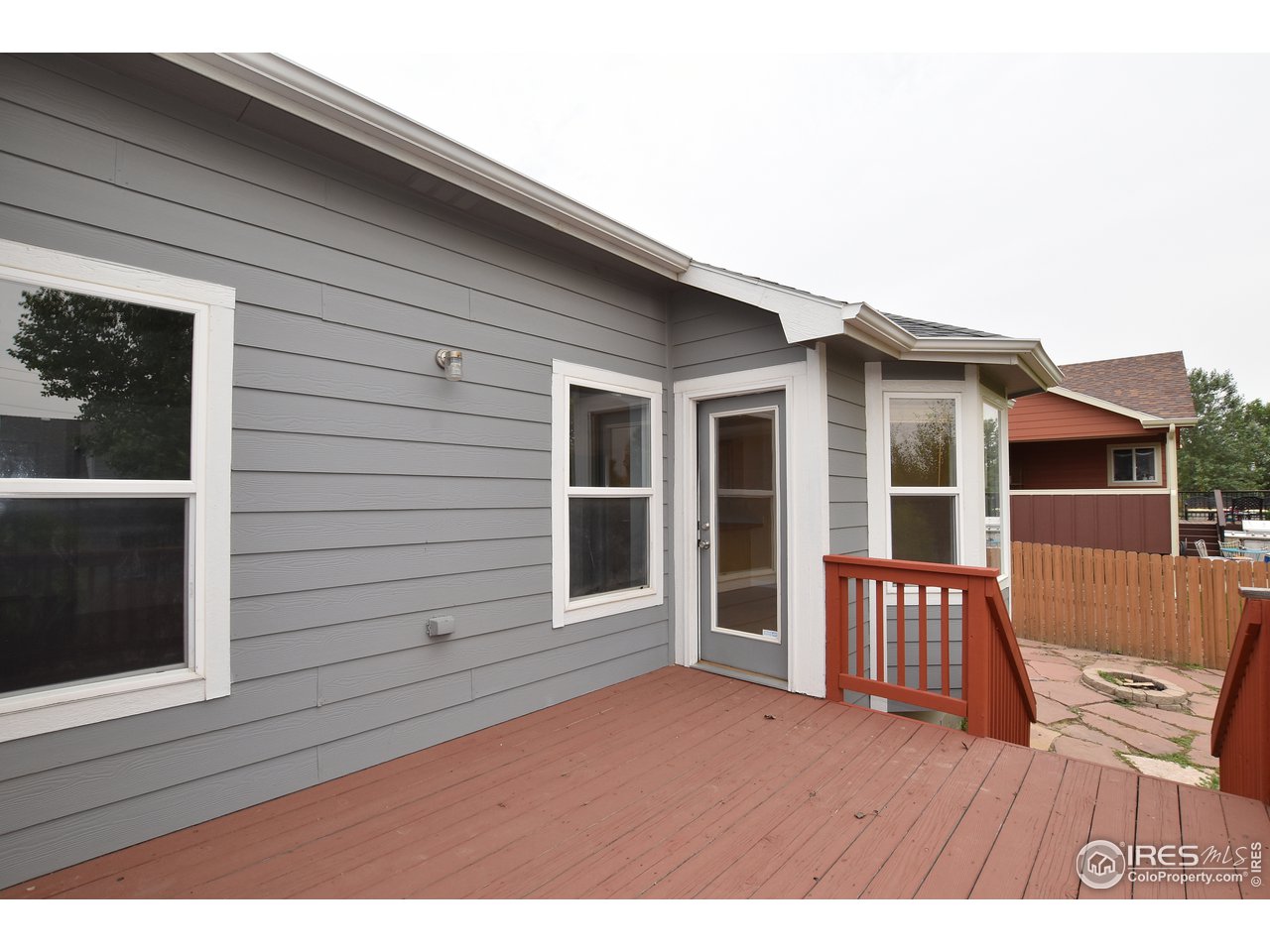 924 Cliffrose Way Severance, CO 80550 - Photo 10 of 40 a view of a house with a deck