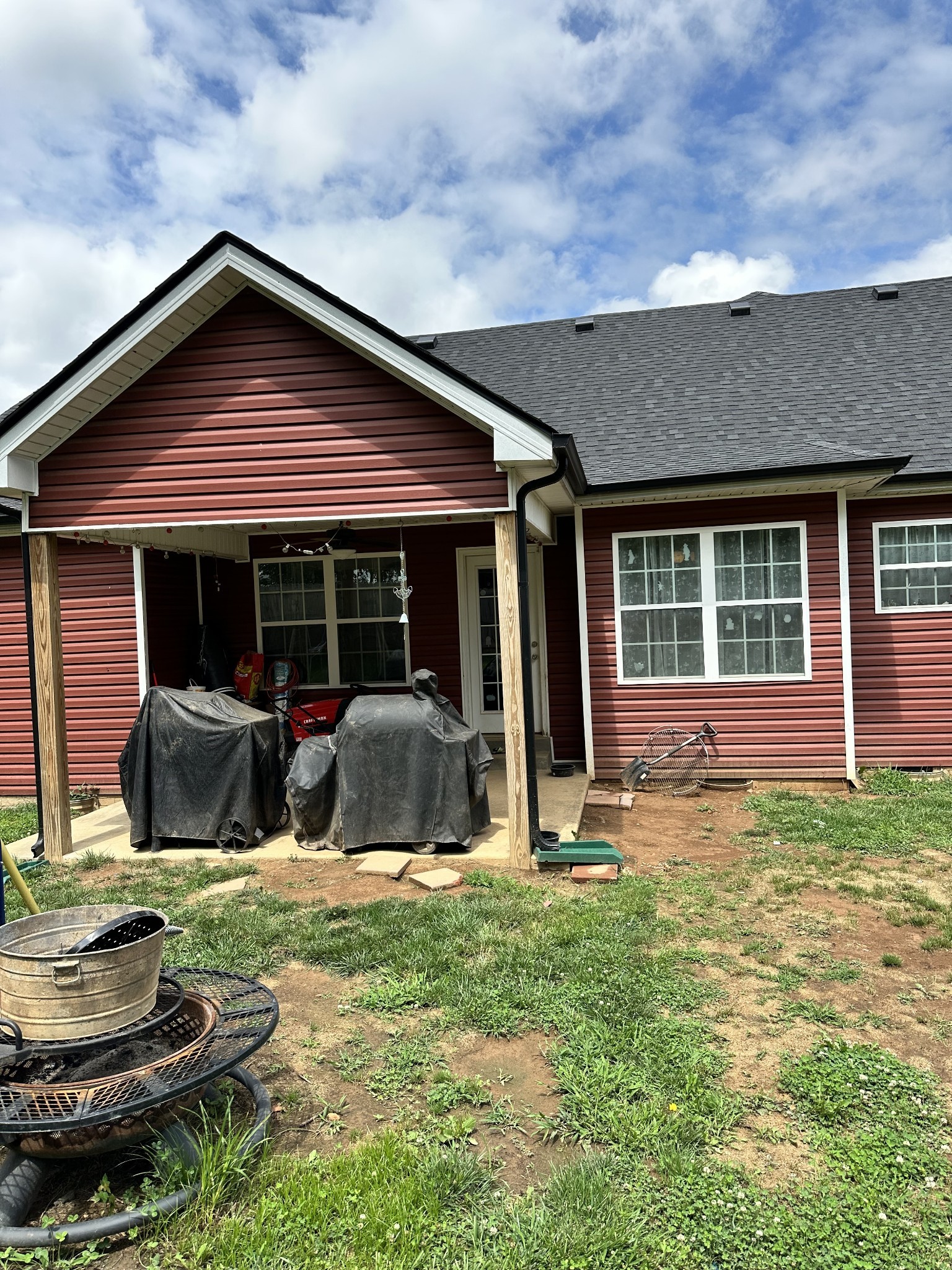 85 Good Hope Cemetery Road Oak Grove, KY 42262 - Photo 5 of 46 a view of a house with backyard sitting area and porch