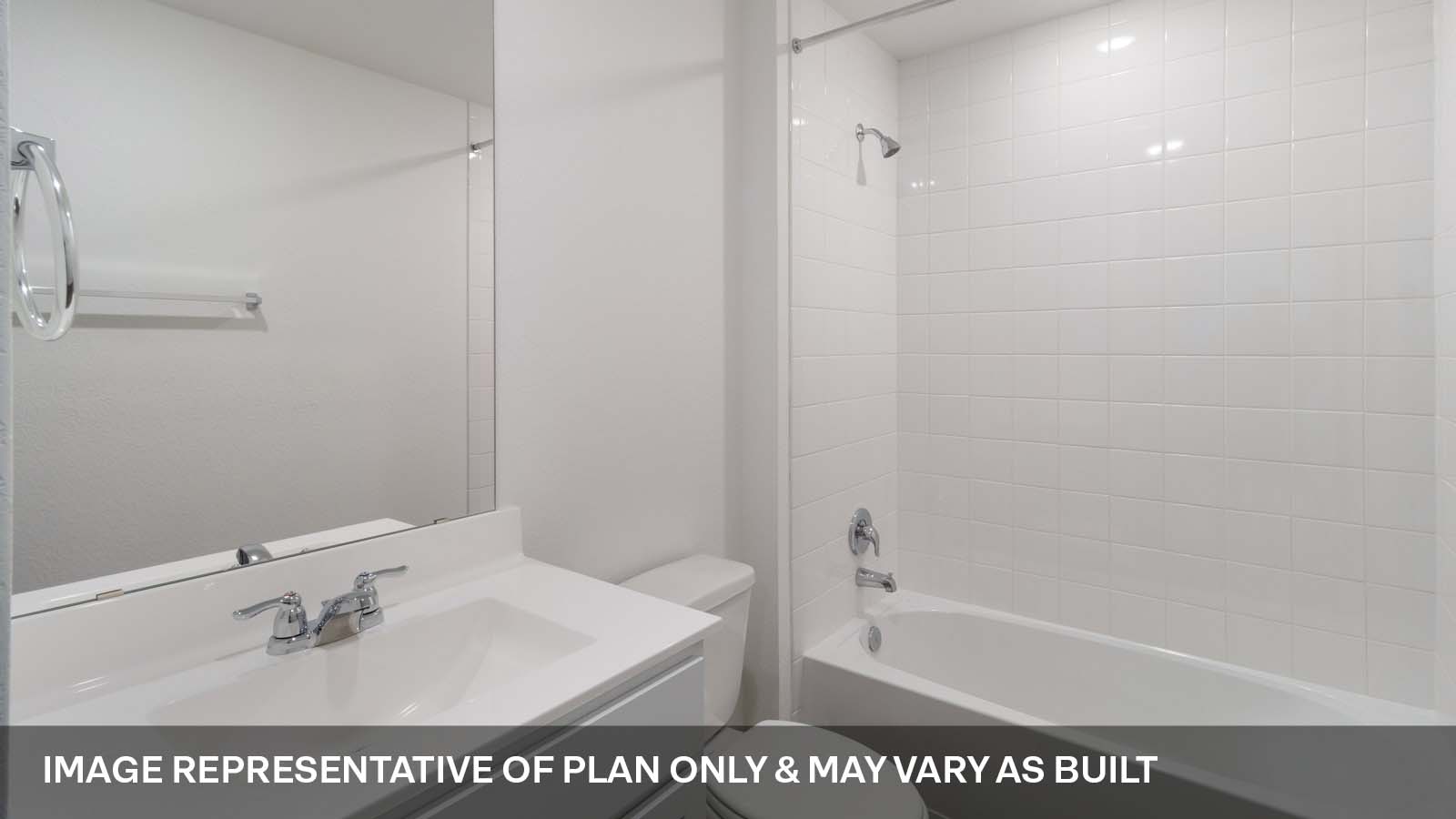 1181 Celosia Loop Kyle, TX 78640 - Photo 13 of 17 a bathroom with a bathtub and shower