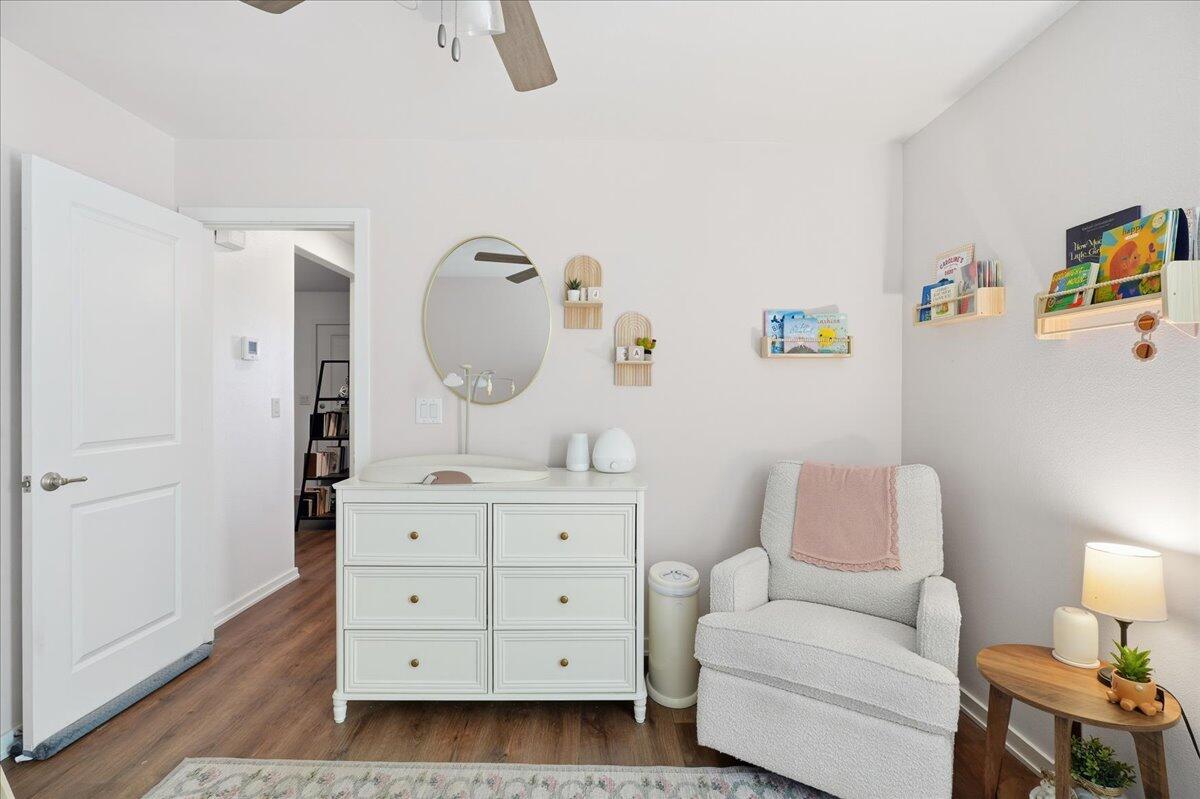 13804 Paris Avenue Lubbock, TX 79423 - Photo 19 of 28 a living room with furniture and a dresser