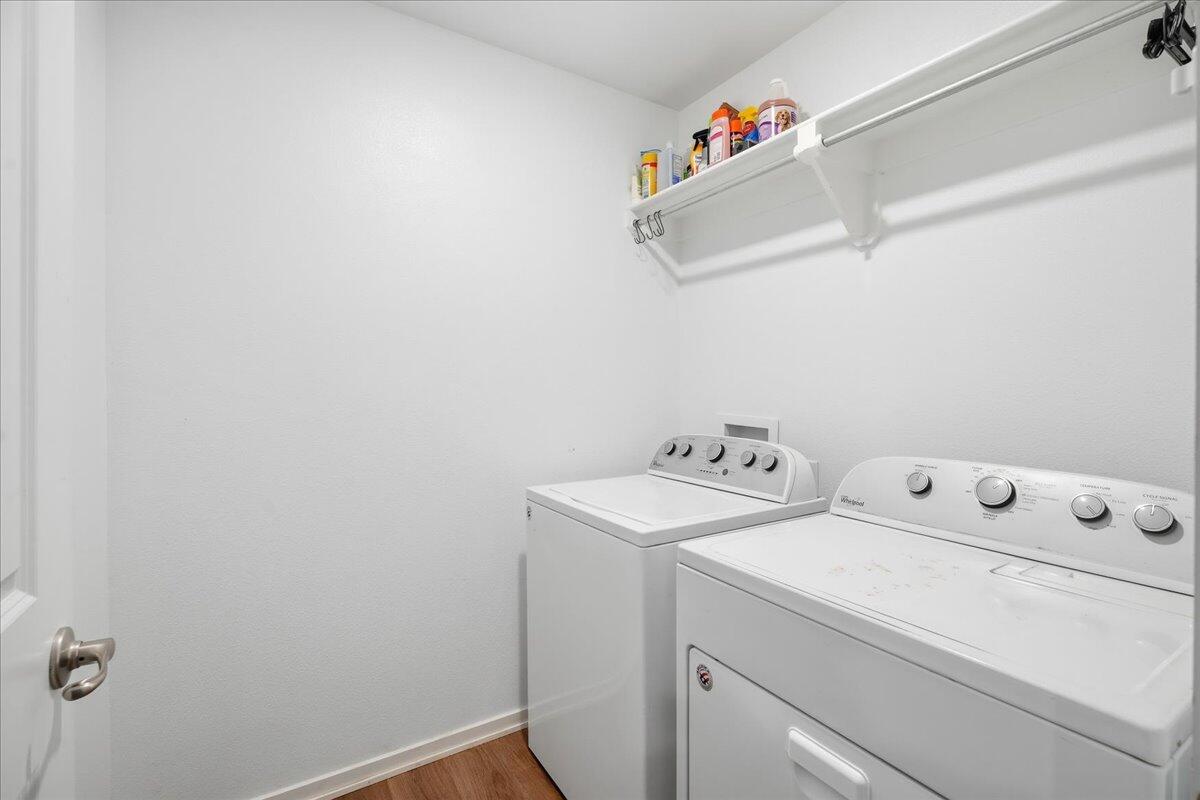 13804 Paris Avenue Lubbock, TX 79423 - Photo 23 of 28 a utility room with dryer and washer