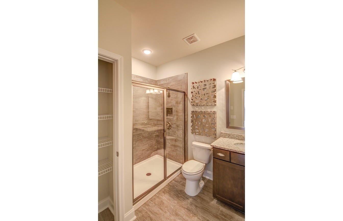 1231 Pebble Run Road Hendersonville, TN 37075 - Photo 18 of 53 a bathroom with a toilet sink and a shower