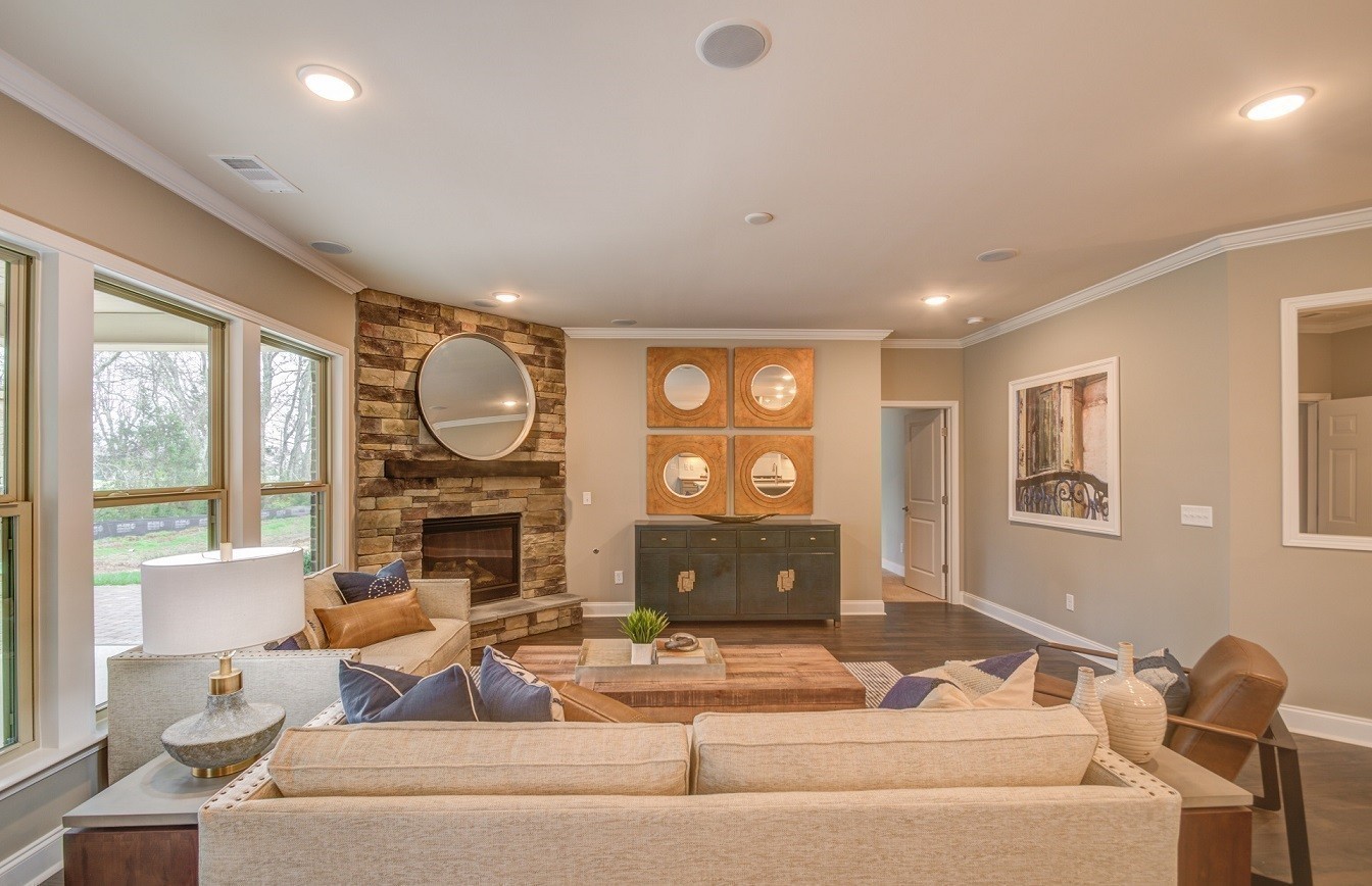 1231 Pebble Run Road Hendersonville, TN 37075 - Photo 7 of 53 a living room with furniture a fireplace and a large window