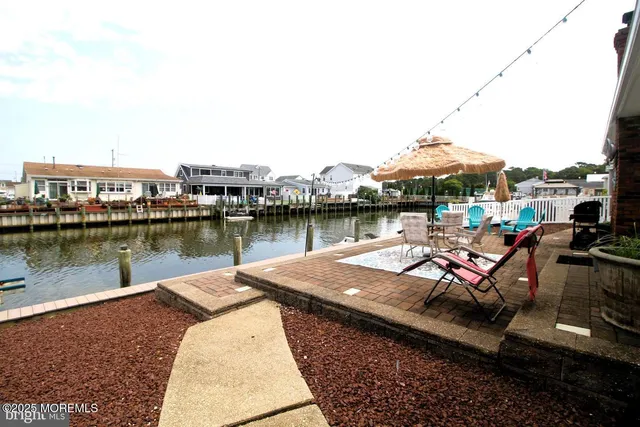 a view of a lake with a patio