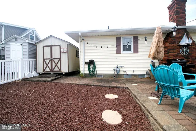 a view of backyard of house