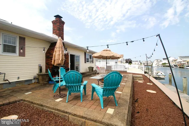 a view of a terrace with furniture