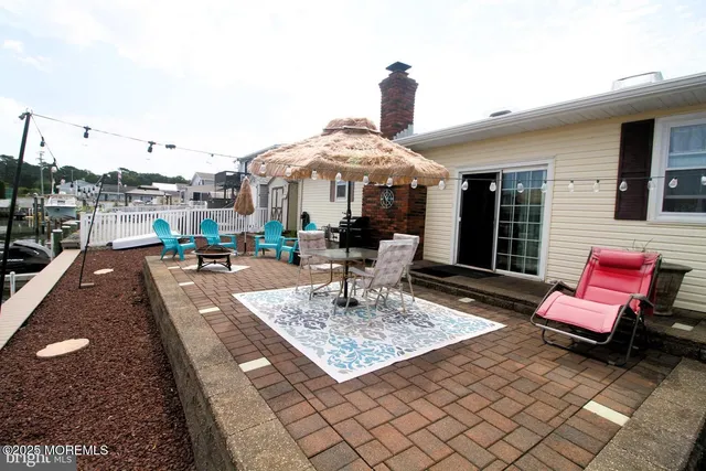 a view of a terrace with sitting area